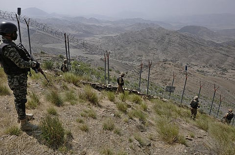 Pakistani soldiers patrolling along Pak-Afghan border in this undated photo. 
