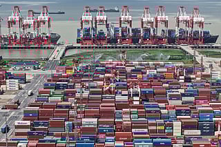An aerial view of a container terminal in Shanghai, China Monday, October 13, 2025.