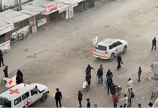 Vehicles of the International Committee of the Red Cross (ICRC) are seen in Gaza on Monday as the release of hostages officially kicks off. The Red Cross confirmed that the exchange process for hostages has started, with hopes that around 48 Israeli captives will be released. 