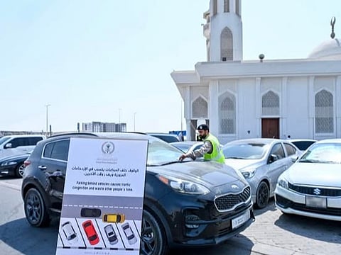 Illegal mosque parking targeted with warning leaflets in Sharjah