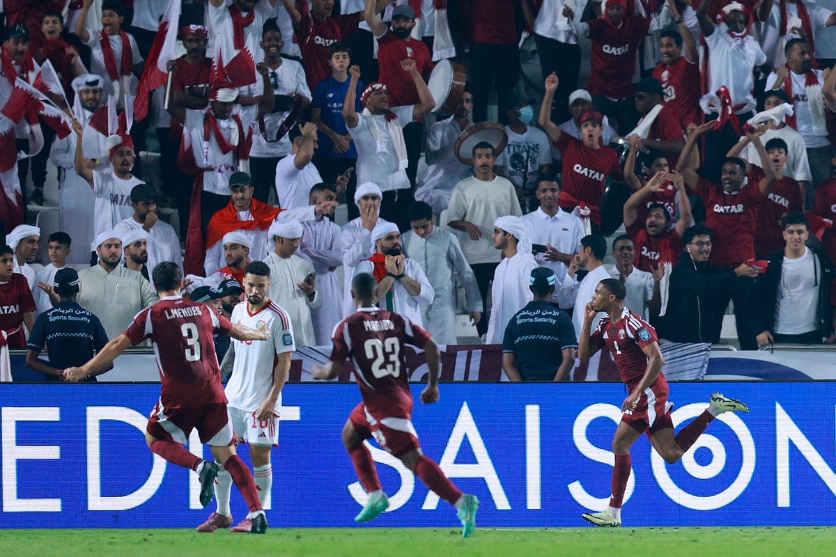 Qatar's defender Pedro Miguel celebrates scoring his team's second goal during the FIFA World Cup 2026 Asian qualifier football match between Qatar and the UAE in Doha on October 14, 2025.