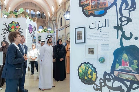 Sheikh Dr Salem bin Abdulrahman Al Qasimi being briefed at the exhibition. 