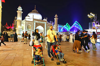 The gates are open! Visitors stream into Global Village for the new season.