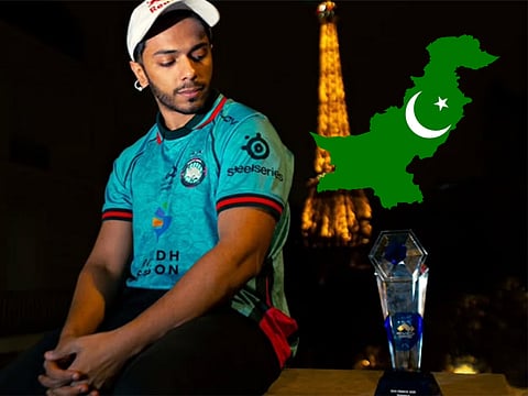 Arslan Ash posing with his EVO trophy