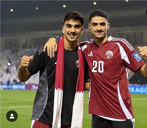 Tahsin celebrating with another Qatari player 