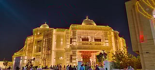 Worshippers visit the Hindu Temple Dubai, which has been decorated with Diwali lights, on Saturday night. 