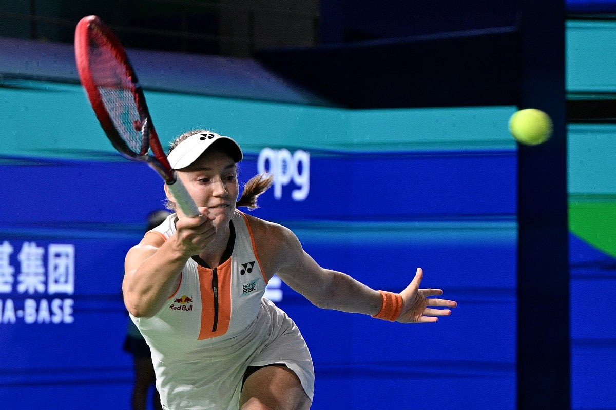 Kazakhstan's Elena Rybakina hits a return to Russia's Ekaterina Alexandrova during the women’s singles final at the WTA Ningbo Open tennis tournament in Ningbo, in China’s eastern Zhejiang province on October 19, 2025.