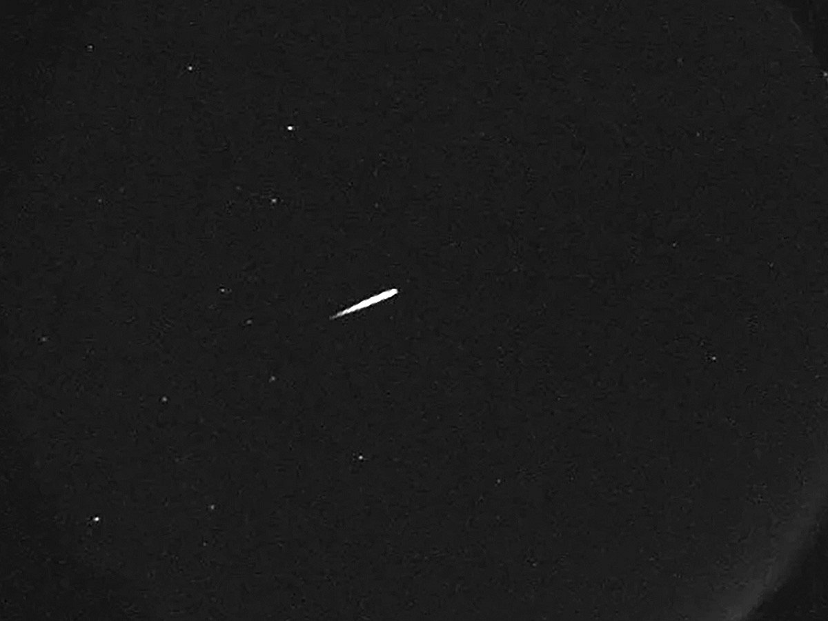 This photo provided by NASA shows a meteor from the Orionid shower on Oct. 13, 2015.