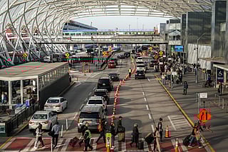 Travellers at Hartsfield-Jackson Atlanta International Airport Ahead Of Thanksgiving Holiday