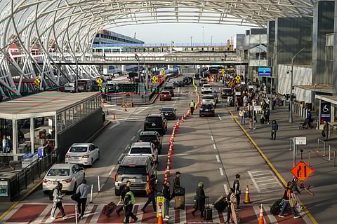 Travellers at Hartsfield-Jackson Atlanta International Airport Ahead Of Thanksgiving Holiday