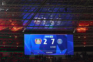 The final score of 2-7 is seen on the scoreboard during the UEFA Champions League football match between Bayer 04 Leverkusen and Paris Saint-Germain (PSG) at the BayArena stadium in Leverkusen, western Germany on October 21, 2025.