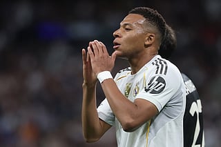 Real Madrid's French forward #10 Kylian Mbappe reacts to missing a goal opportunity during the UEFA Champions League league phase day 3 football match between Real Madrid CF and Juventus at Santiago Bernabeu Stadium in Madrid on October 22, 2025.