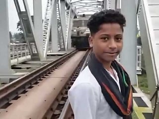 A gust from the speeding locomotive toppled his phone, and the next moment he was struck and killed instantly. 
