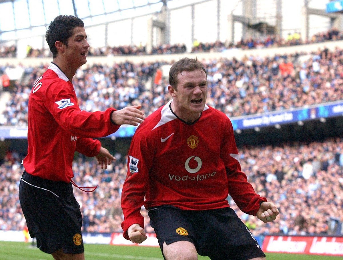 Manchester United's Wayne Rooney (R) celebrates with Portuguese teammate Cristiano Ronaldo after scoring to make it 1-0 against Manchester City back in 2005