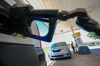 A person pays for fuel at a Shell gas station, Tuesday, July 29, 2025.