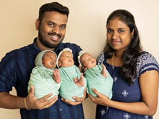 Karthikeyan Thangavel and Vinitha Nagaraj with their triplets born at Medeor Hospital, Dubai.