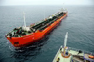 A picture taken on April 9, 2011 shows Caspian Stream tanker aproaching the Russian LUKOIL ice-resistant fixed platform LSP-1, built at the Astrakhansky Korabel shipyard, intended to drill and operate wells and collect and pre-treat reservoir content at Korchagin's oil field in the Russian sector of the Caspian Sea some 180 km outside Astrakhan.