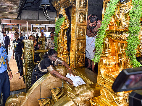 Indian President Droupadi Murmu performs a ritual during her visit to Sabarimala, in Pathanamthitta on Wednesday. [Illustrative image]