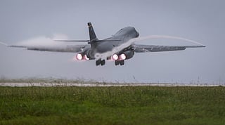 In this file photo released by the U.S. Air Force, a Air Force B-1B Lancer bomber takes off from Andersen Air Force Base, Guam, to fly a mission with two Koku Jieitai (Japan Air Self-Defense Force) F-15s, Sept. 9, 2017.