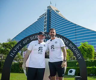Rio Ferdinand with former teammate Wayne Rooney