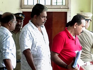 The Special Investigation Team (SIT) probing the Sabarimala temple gold scam takes former Travancore Devaswom Board (TDB) administrative officer Murari Babu (centre) for medical examination from the Thiruvananthapuram Crime Branch office on Thursday. 