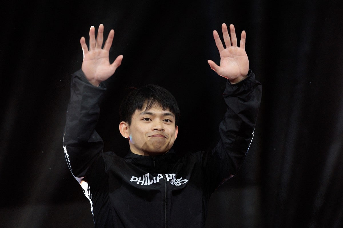 Philippines' Carlos Edriel Yulo gestures after winning the gold medal during the victory ceremony for the men's vault final at the 53rd FIG Artistic Gymnastics World Championships in Jakarta on October 25, 2025.