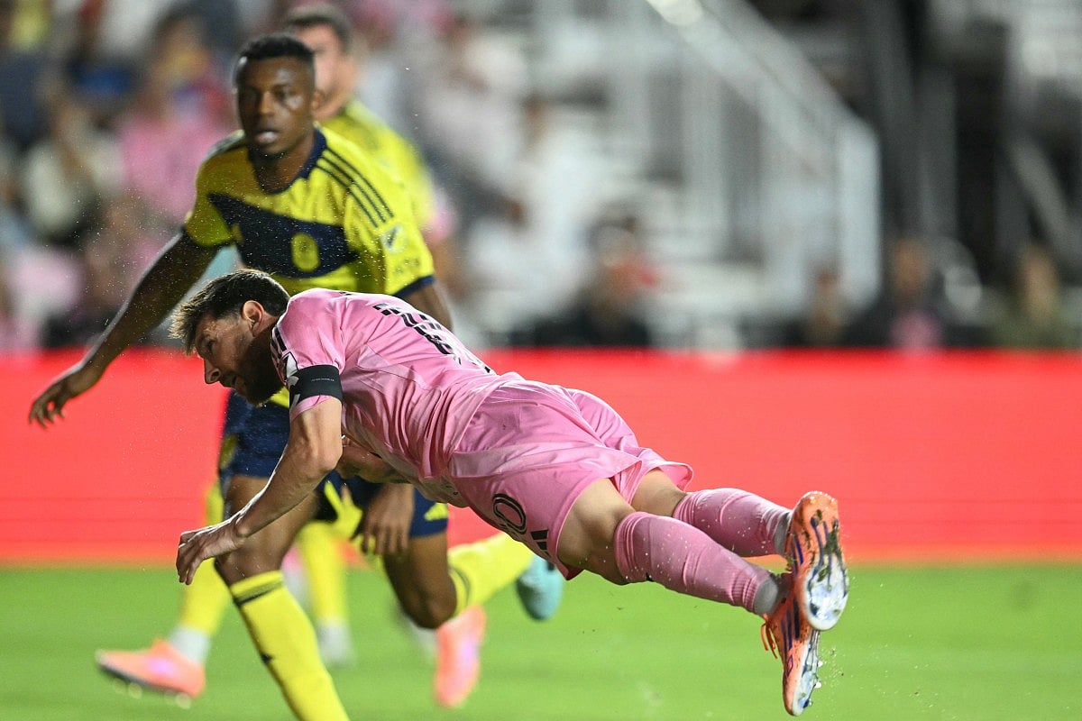 Inter Miami's Argentine forward Lionel Messi watches the ball as he scores with a header during the Major League Soccer (MLS) playoff football match between Inter Miami and Nashville SC at Chase Stadium in Fort Lauderdale, Florida on October 24, 2025.