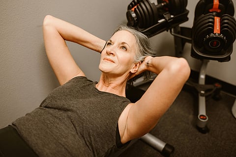 Exercise, yoga, and stress management can help slow hair loss, explain experts.