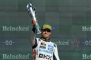 McLaren driver Lando Norris of Britain celebrates after winning the Formula One Mexico Grand Prix in Mexico City, Sunday, Oct. 26, 2025.