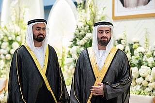 Abdulaziz, right, and Abdulla Faisal Al Bannai host a wedding reception at Erth Abu Dhabi.