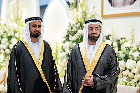 Abdulaziz, right, and Abdulla Faisal Al Bannai host a wedding reception at Erth Abu Dhabi.
