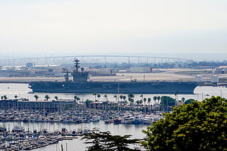 The USS Nimitz (CVN 68) departs San Diego Bay, Aug. 19, 2023, at Mission Beach, in San Diego. (Nelvin C. Cepeda/The San Diego Union-Tribune via AP, File)