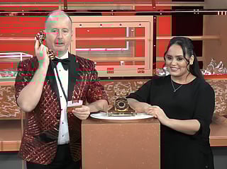 UK expat wins gold after nearly missing Big Ticket call
