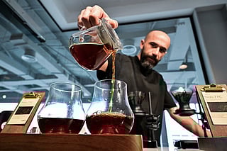 Barista Serkan Sagsoz, co-founder of Julith Coffee, at his cafe in Dubai on October 30, 2025.