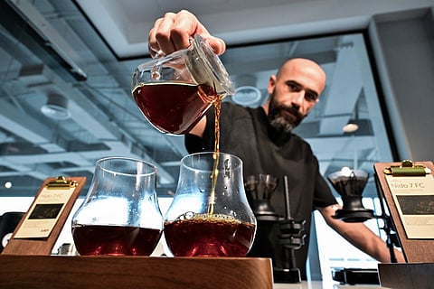 Barista Serkan Sagsoz, co-founder of Julith Coffee, at his cafe in Dubai on October 30, 2025.