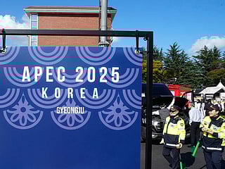 South Korean police officers patrol near the venue of the 2025 Asia-Pacific Economic Cooperation (APEC) Summit in Gyeongju, South Korea.
