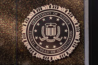 FILE - The seal of the Federal Bureau of Investigation is displayed at its headquarters in Washington, Nov. 18, 2024. (AP Photo/Jose Luis Magana, File)