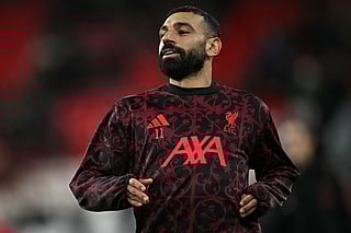 Liverpool's Egyptian striker Mohamed Salah warms up during a training session.