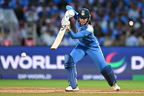 India's Smriti Mandhana plays a shot during the ICC Women's Cricket World Cup 2025 one-day international (ODI) final match between India and South Africa at the DY Patil Stadium in Navi Mumbai on November 2, 2025.