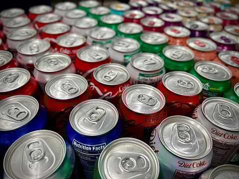 Schools must maintain a list of 13 prohibited food and beverage categories, including soda