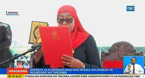 This video grab made from a video from the Tanzania Broadcasting Corporation (TBC) shows Samia Suluhu Hassan taking the oath of office during her inauguration ceremony in Dar es Salaam.
