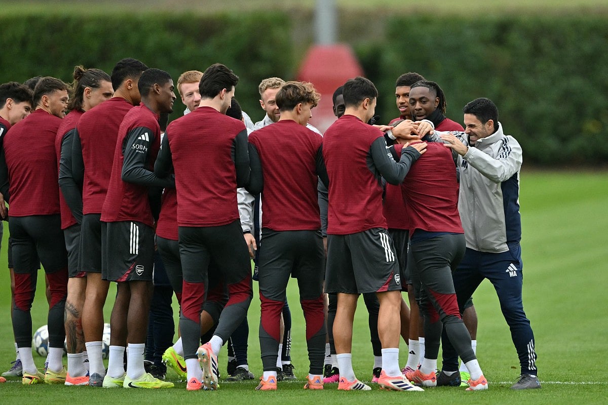 Arsenal's Spanish manager Mikel Arteta (R) and his players during a team training session at the Arsenal Training centre in London Colney, north of London, on November 3, 2025, on the eve of their Uefa Champions League league phase football match against Slavia Prague.