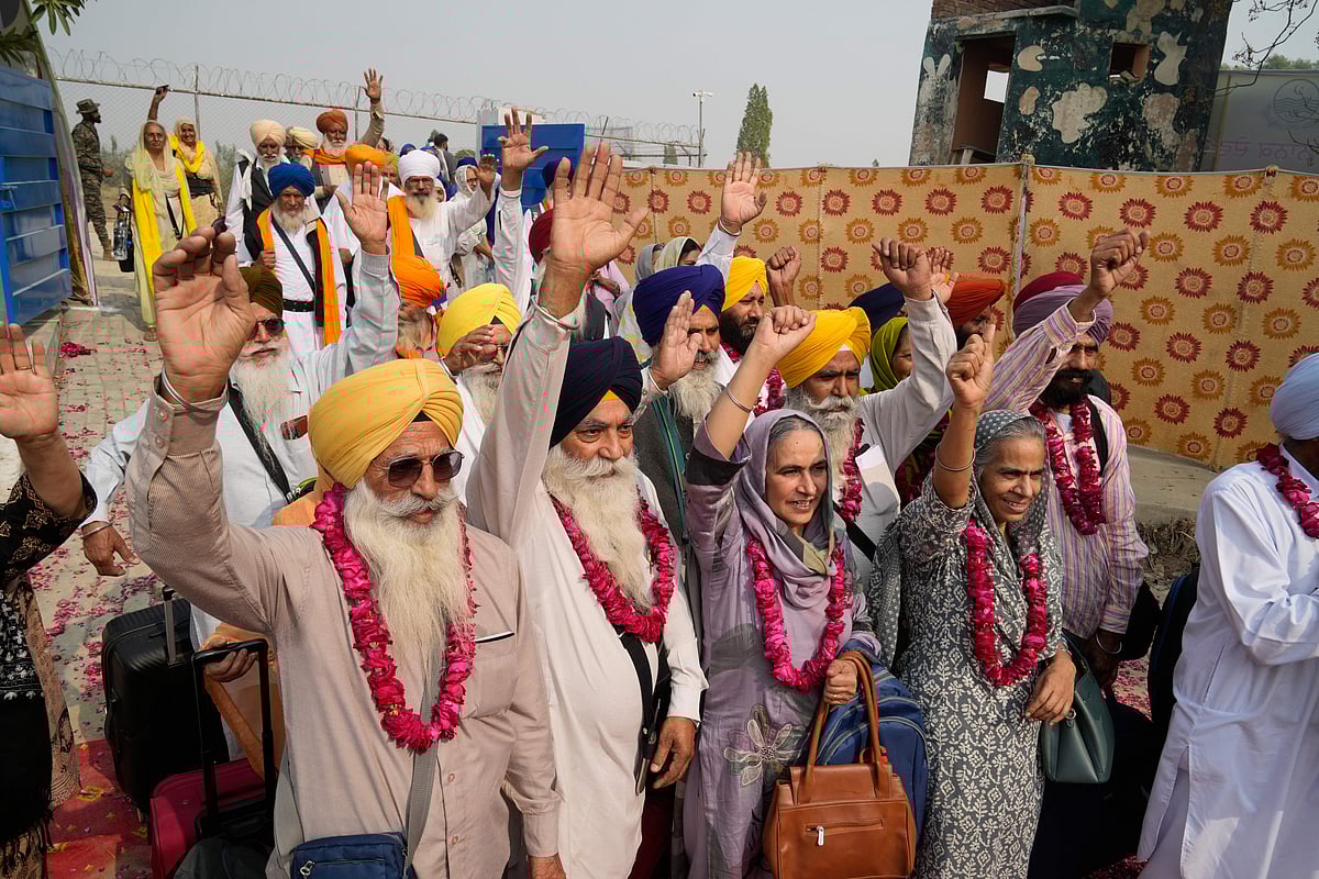 Indian Sikh pilgrims cross into Pakistan through the Wagah border to join Guru Nanak’s birth anniversary celebrations at Gurdwara Janam Asthan in Nankana Sahib, near Lahore.