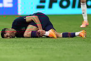 Paris Saint-Germain's Moroccan defender #02 Achraf Hakimi reacts after picking up an injury during the UEFA Champions League, league phase day 4, football match between Paris Saint-Germain (PSG) and FC Bayern Munich at the Parc des Princes in Paris, on November 4, 2025.