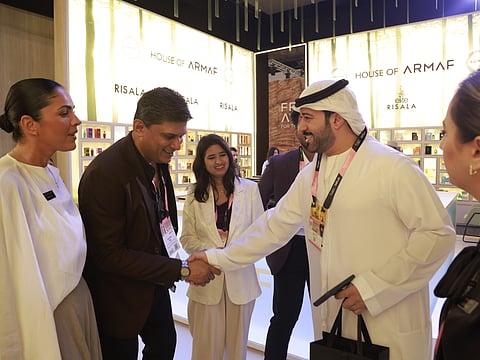 Saoud AlKaabi, Emirati actor, producer, influencer, and TV presenter, greets Evarist Peter, Director of Business Development Strategy, ARMAF at the venue