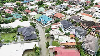 Residential areas are flooded by Typhoon Kalmaegi as it affects Cebu city, central Philippines, Tuesday Nov. 4, 2025. 