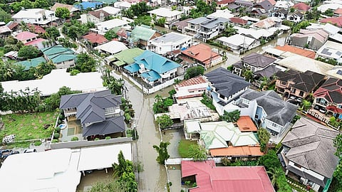 Residential areas are flooded by Typhoon Kalmaegi as it affects Cebu city, central Philippines, Tuesday Nov. 4, 2025. 