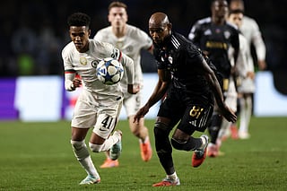 Chelsea's Brazilian midfielder #41 Estevao and Qarabag's Colombian defender #81 Kevin Medina vie for the ball during the UEFA Champions League league phase football match between Qarabag and Chelsea at the Tofiq Bahramov Republican Stadium in Baku on November 5, 2025.