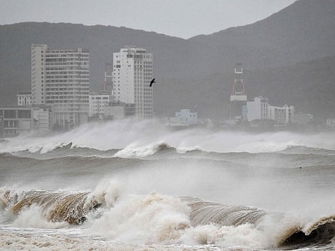 Waves crash onto Quy Nhon beach ahead of the arrival of Typhoon Kalmaegi in Gia Lai province in central Vietnam.