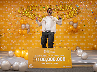 Anilkumar Bolla celebrating his historic win at The UAE Lottery's studio. 